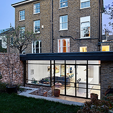 Clement's striking black steel door screen chosen for this London home renovation