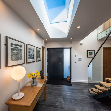 Frameless rooflights help accentuate this new builds open plan style